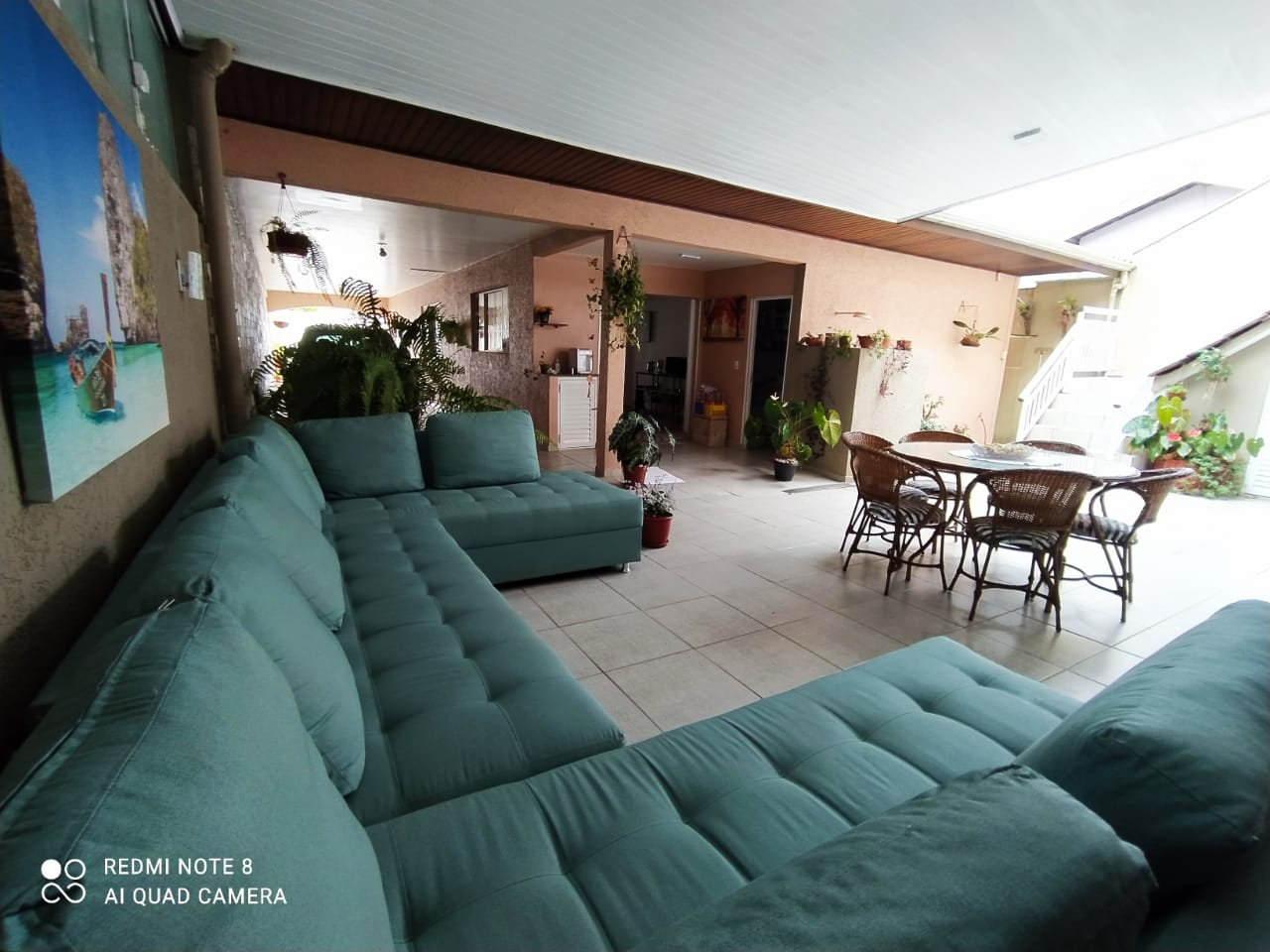 Sala de estar e jantar integrada com varanda